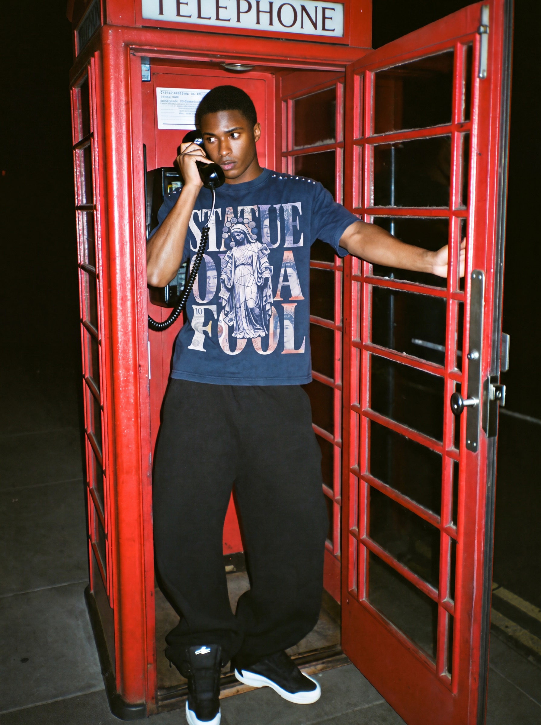 Statue of a Fool campaign: phone box, tee, navy
