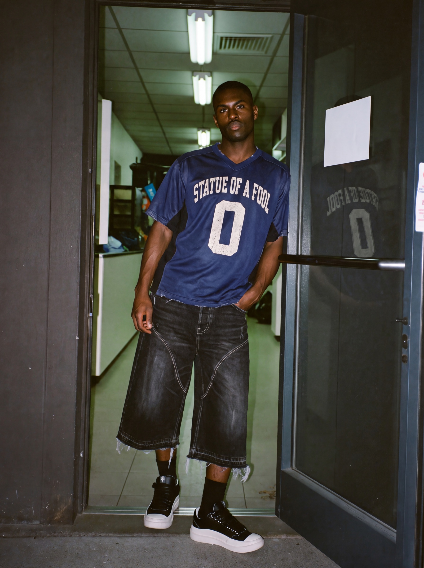 Statue of a Fool campaign: laundrette door, jersey, jorts