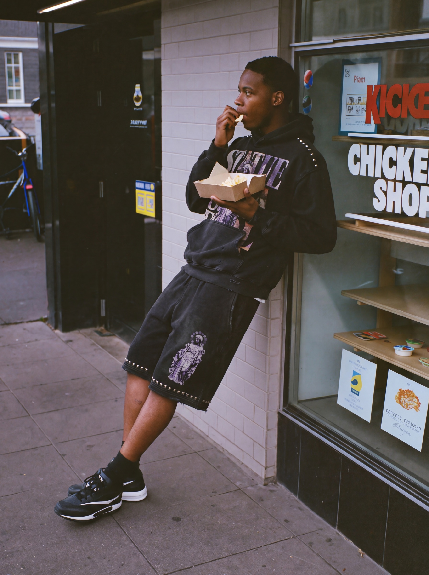 Statue of a Fool campaign: chicken shop, daylight, hood, shorts