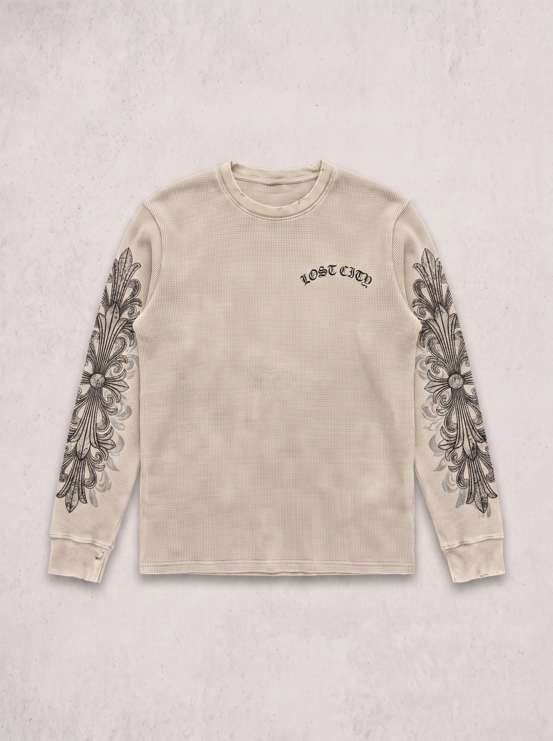 The same longsleeve in bone cream, the filigree printed in dark ink