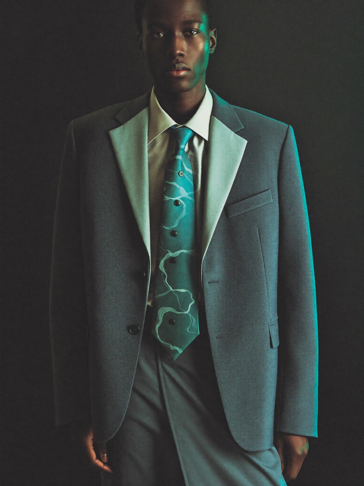 Editorial fashion frame developing from raw AI model output to a hand-graded, shipped image